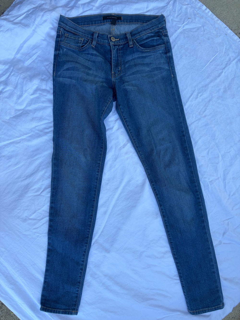 medium wash blue denim jeans